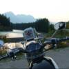 Sunset at the Athabasca River in Jasper National Park, Alberta, Canada. Harley-Davidson V-Rod at this point of interest along side the Icefields Parkway, Highway 93.